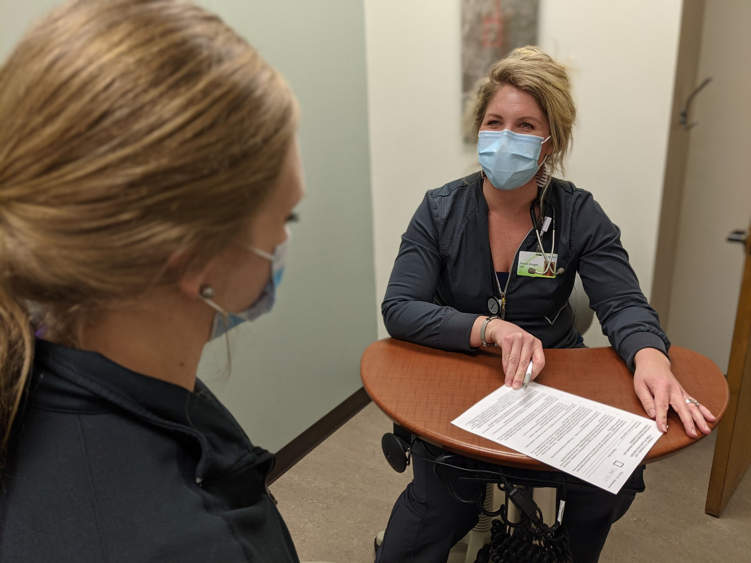 NP Devon Kruger with Patient NP Devon Kruger with Patient