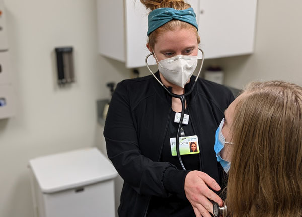 NP Elizabeth McDowell with Patient NP Elizabeth McDowell with Patient