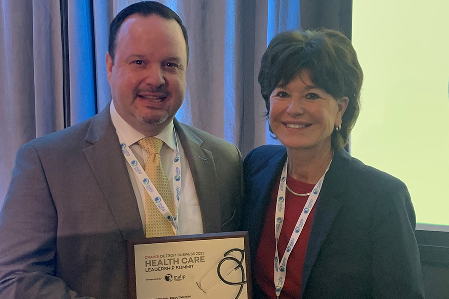 EWSH Denny Martin, D.O Healthcare Hero Award with University of Michigan Health Regional President Margaret Dimond, Oct. 2023