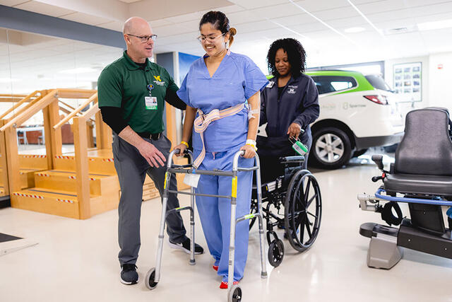 Mary Free Bed Carousel - Woman with Walker and Wheelchair Mary Free Bed Carousel - Woman with Walker and Wheelchair