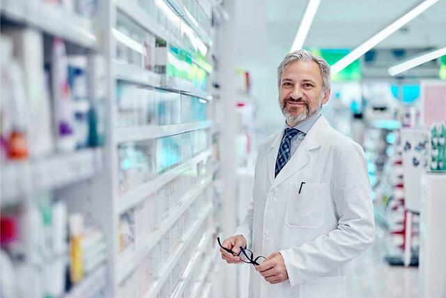 Smiling Male Pharmacist | 900x600px