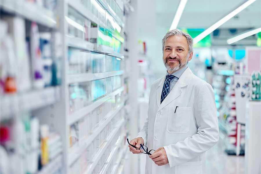 Smiling Male Pharmacist | 900x600px